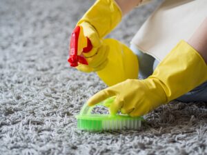 Close-up of professional disinfecting surfaces using cleaning supplies by Alamo Steam Team in San Antonio, TX