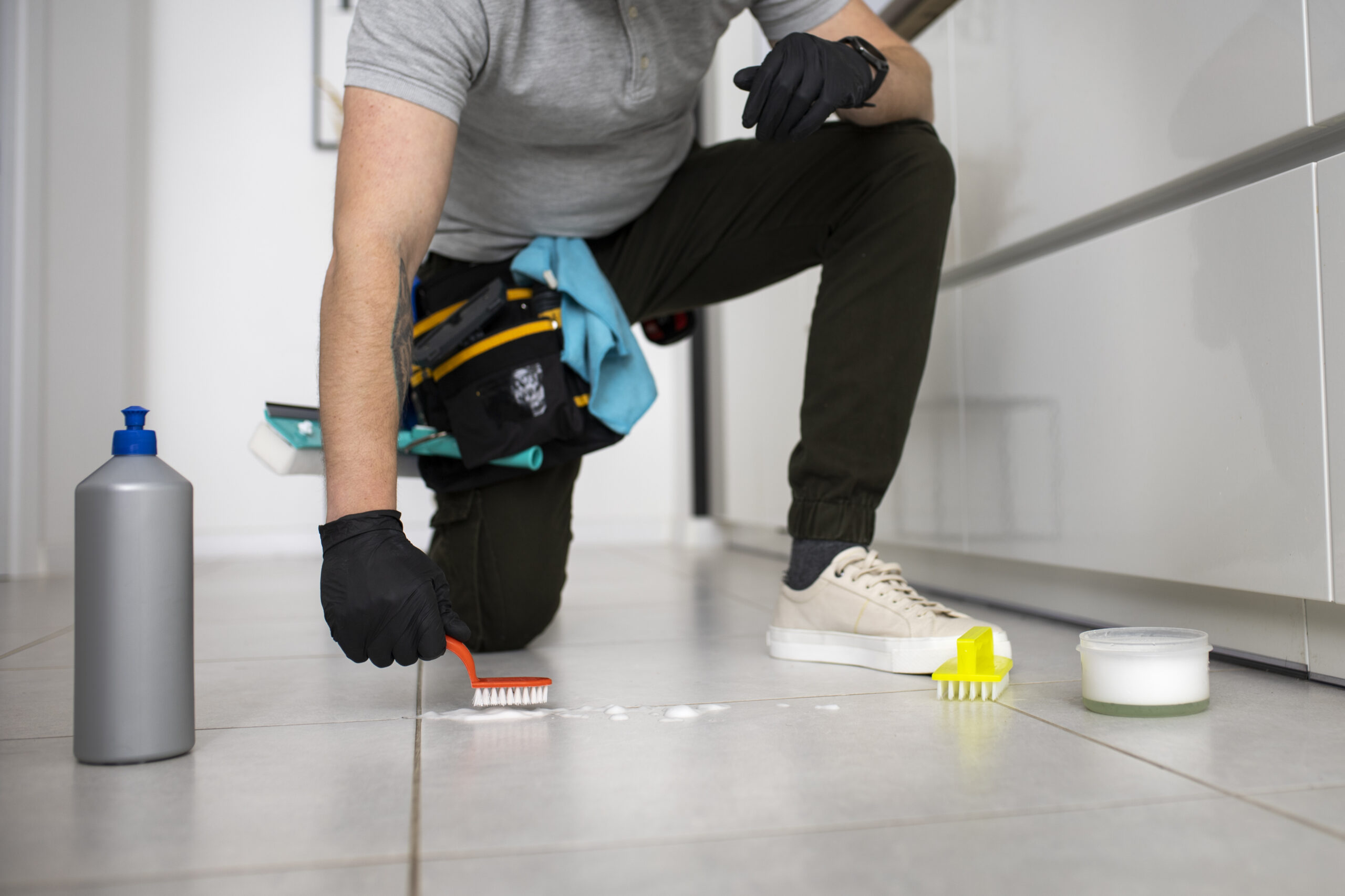 man doing professional home cleaning service