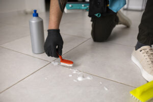 Man performing professional home cleaning service in residential space in San Antonio, TX by Alamo Steam Team